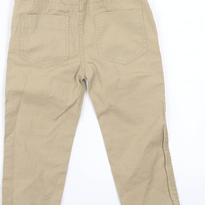 Brand and care label for Fox boys’ beige bloomer trousers, size 2, years