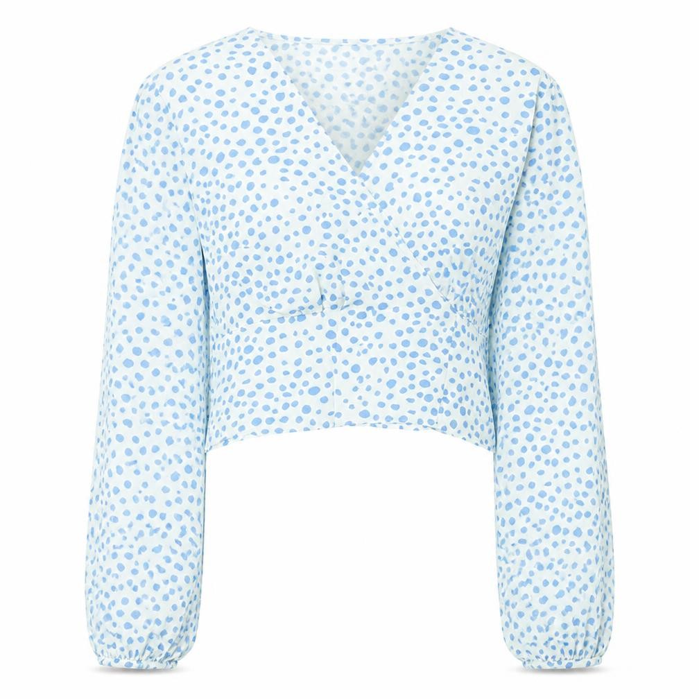Front view of Primark women’s white polka dot cardigan jumper, size UK 14