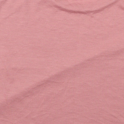 Brand and care label for Bella + Canvas women’s pink basic t-shirt, size M