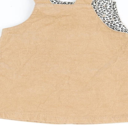 Brand and care label for Tu Beige Fit & Flare, size 0-3, Months