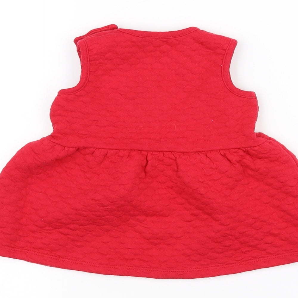 Brand and care label for Nutmeg Baby Red A-Line, size 3-6, Months