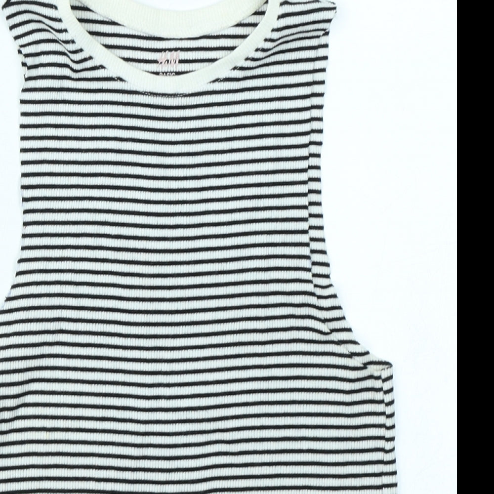 Close-up detail of H&M girls’ black striped basic tank, size 7-8, years