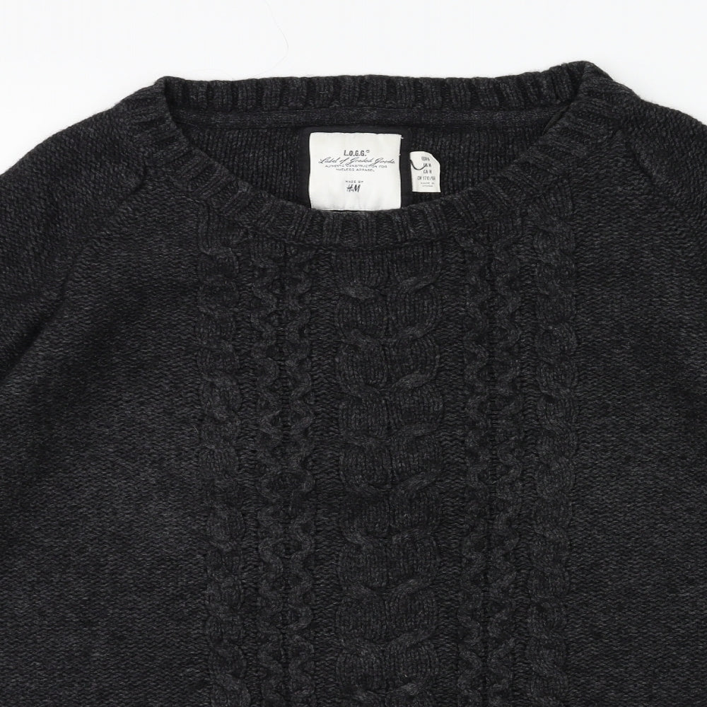 Close-up detail of H&M women’s green knit jumper, size M