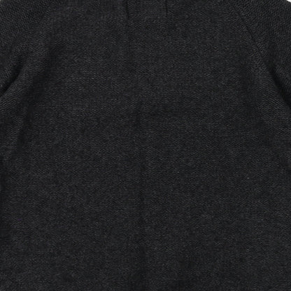 Brand and care label for H&M women’s green knit jumper, size M