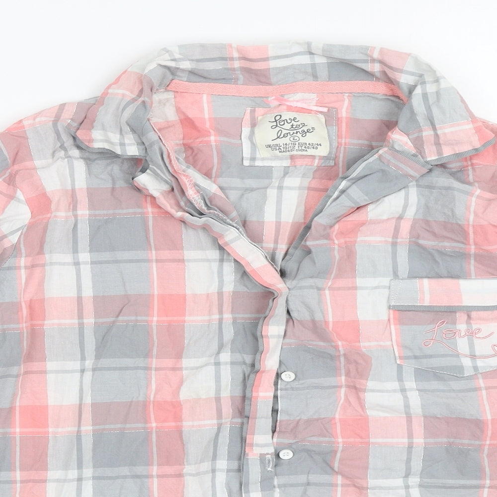 Close-up detail of Primark women’s pink check top pyjama top, size UK 14