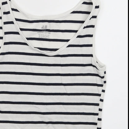 Close-up detail of H&M girls’ white striped basic tank, size 11-12, years