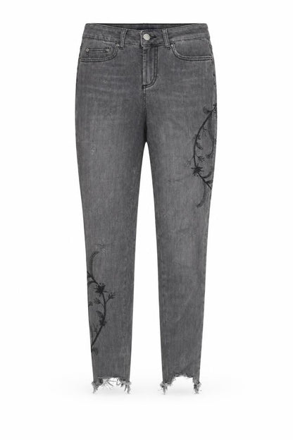Front view of Pieces women’s black floral denim skinny jeans, size XS, 28-inch leg