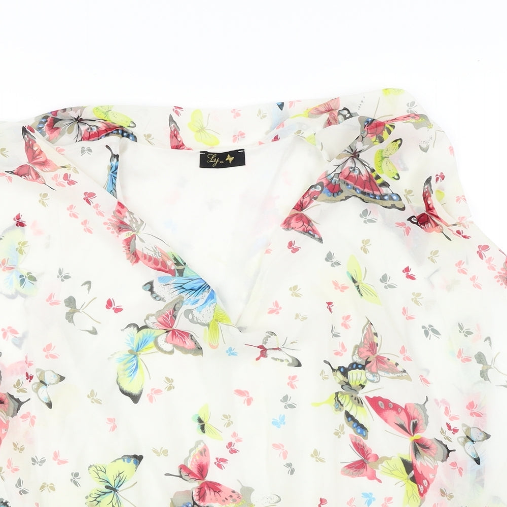 Close-up detail of ly women’s white floral basic blouse, size UK 8