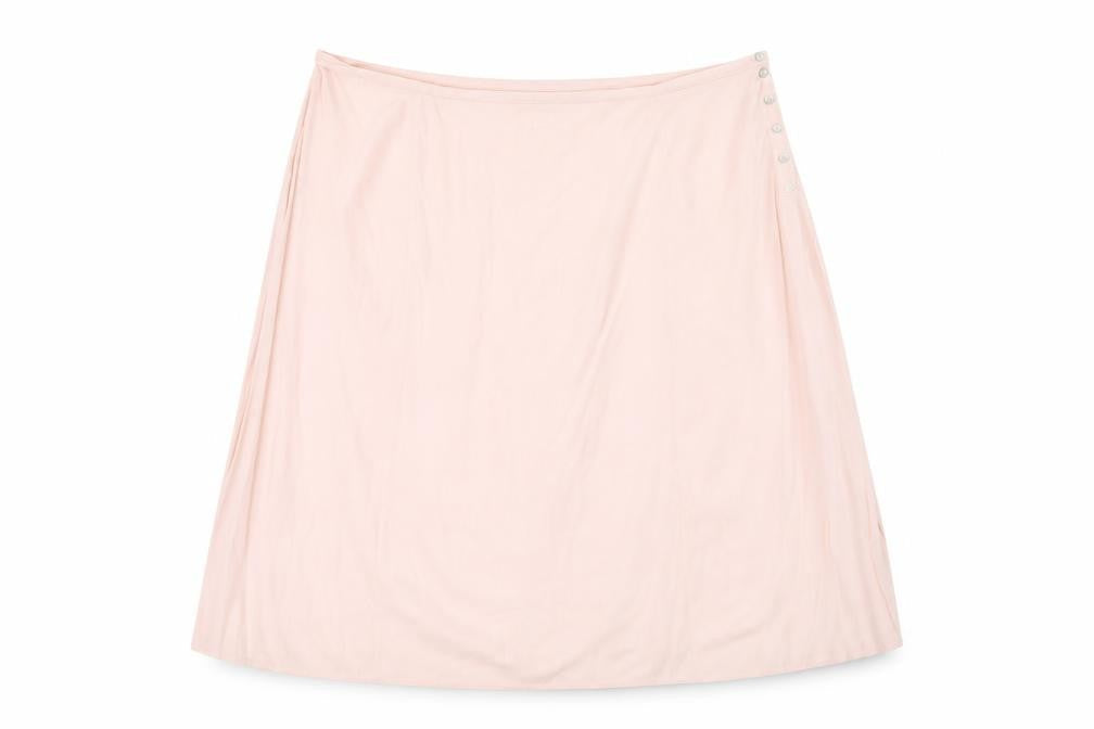 Front view of Essence women’s pink a-line skirt, size UK 38, in
