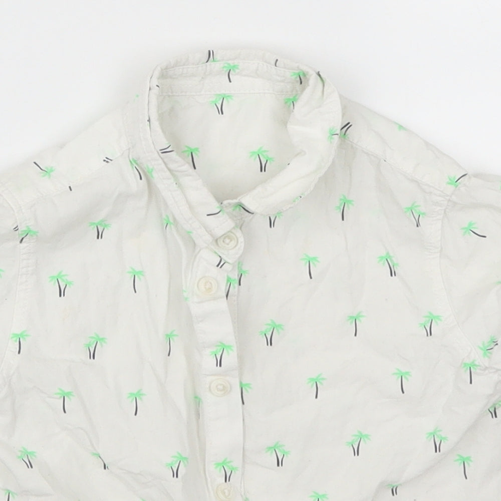 Close-up detail of Matalan boys’ white basic button-up, size 3-4, years - palm trees