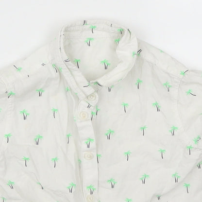 Close-up detail of Matalan boys’ white basic button-up, size 3-4, years - palm trees