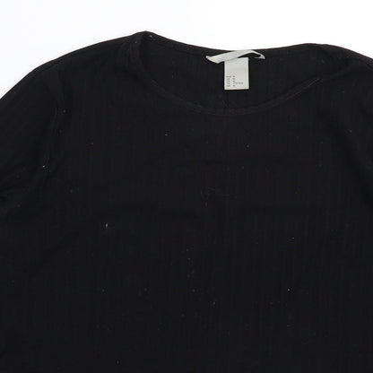 Close-up detail of H&M women’s black jumper, size M
