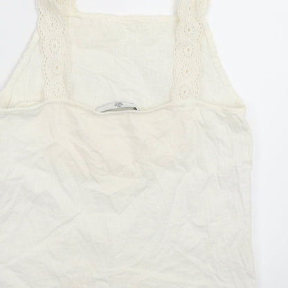 Brand and care label for Marks & Spencer girls’ white basic tank, size 10-11, years