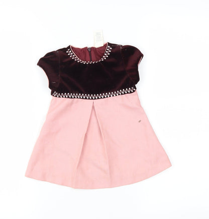 Front view of Preworn boys’ pink shift, size 12, months