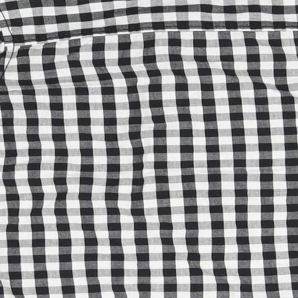 Brand and care label for St Bernard boys’ black check basic button-up, size 4, years