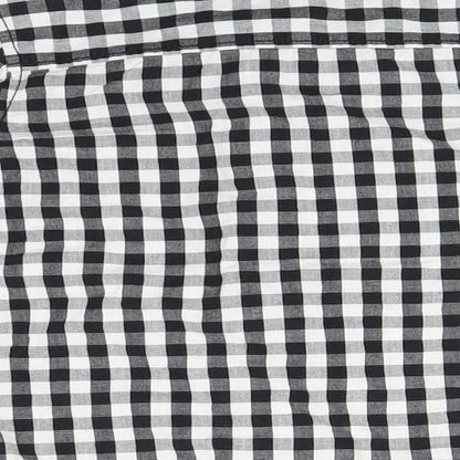 Brand and care label for St Bernard boys’ black check basic button-up, size 4, years