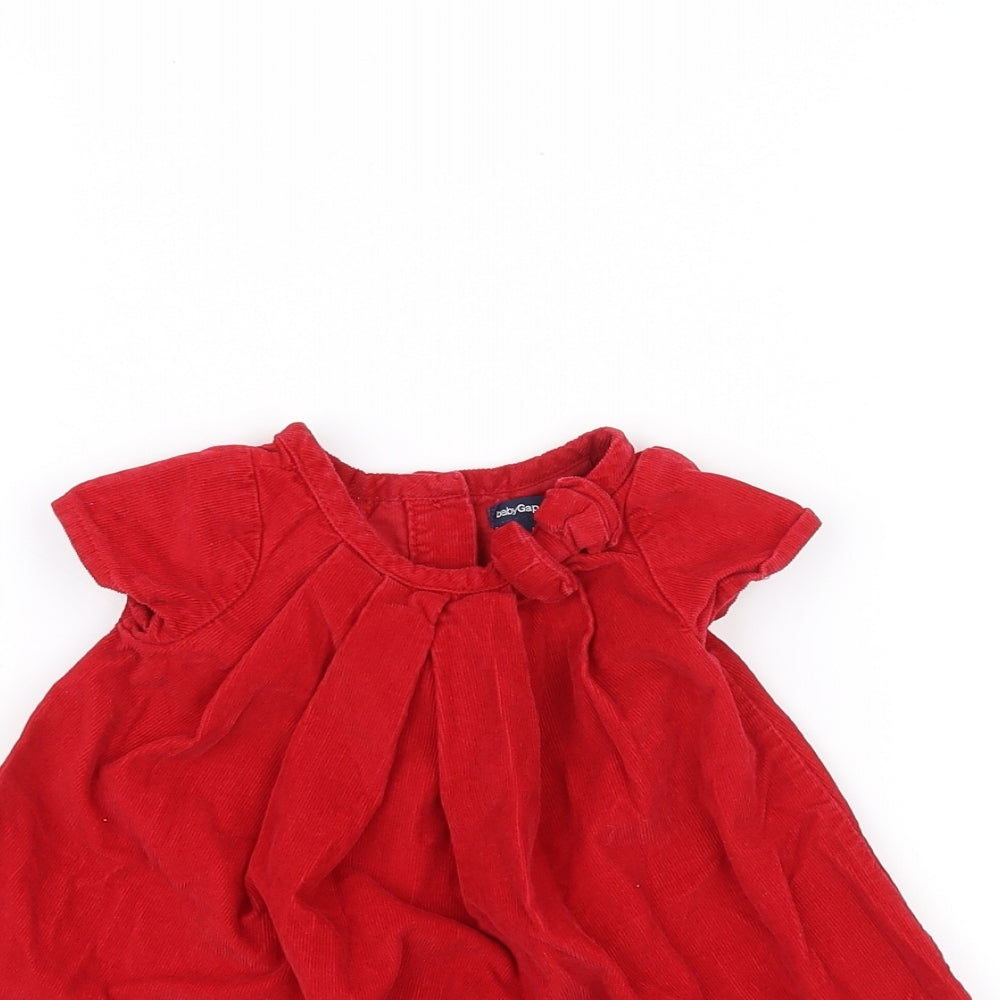 Close-up detail of Gap Baby Red A-Line, size 0-3, Months