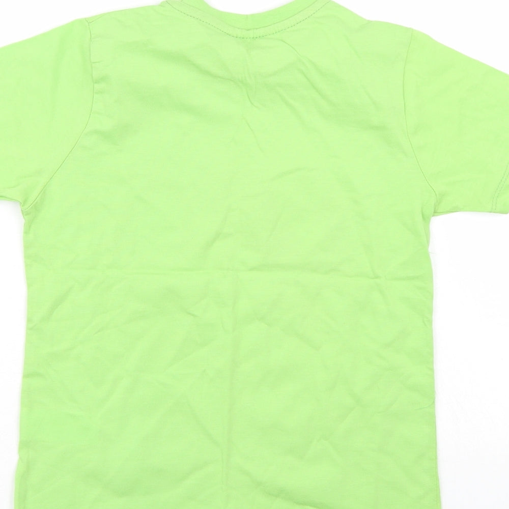 Brand and care label for Kool Kids boys’ green basic t-shirt, size 10, years