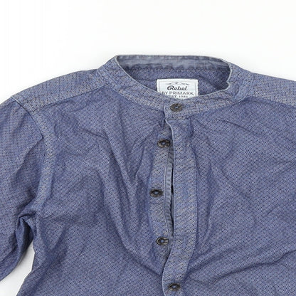 Close-up detail of Primark girls’ blue basic button-up, size 7-8, years