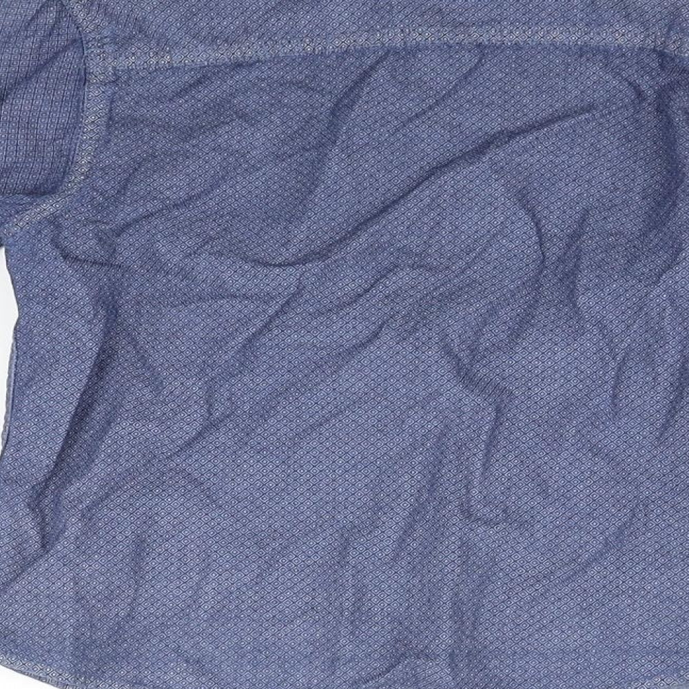 Brand and care label for Primark girls’ blue basic button-up, size 7-8, years