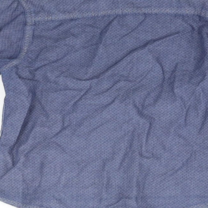 Brand and care label for Primark girls’ blue basic button-up, size 7-8, years