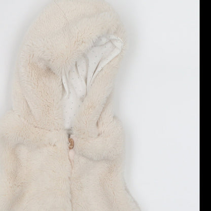 Close-up detail of Primark girls’ white jacket, size 0-3, months