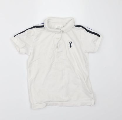Front view of Next boys’ white basic polo, size 5, years
