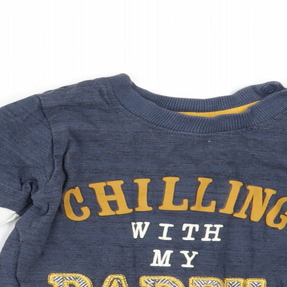 Close-up detail of Nutmeg boys’ blue basic t-shirt, size 6-9, months - chilling with my daddy