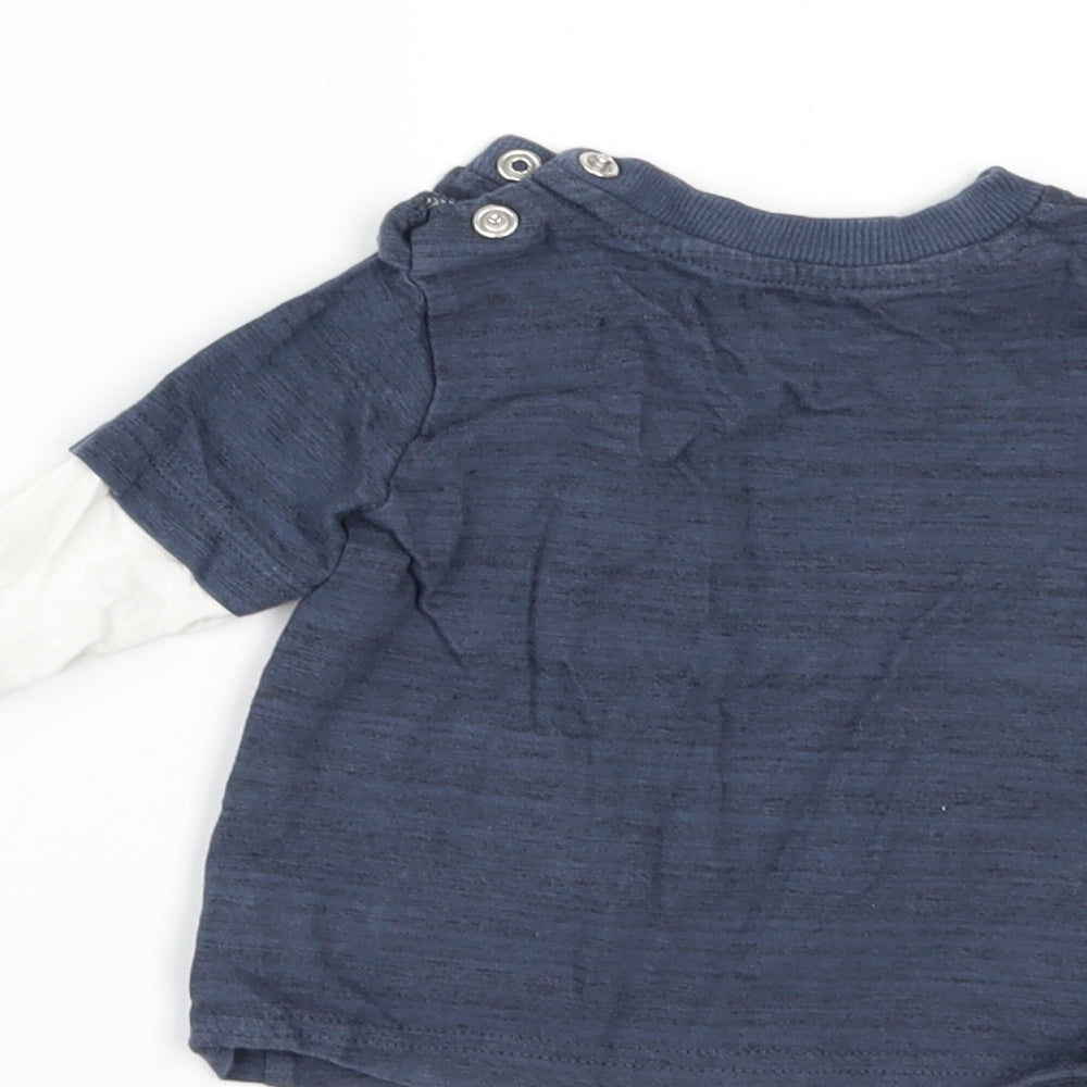 Brand and care label for Nutmeg boys’ blue basic t-shirt, size 6-9, months - chilling with my daddy