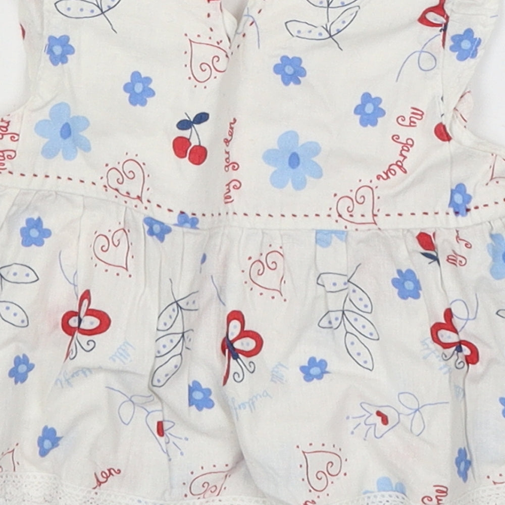 Brand and care label for Pumpkin Patch Baby White Fit & Flare, size 3-6, Months