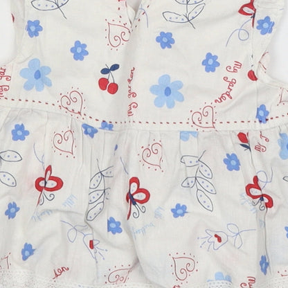 Brand and care label for Pumpkin Patch Baby White Fit & Flare, size 3-6, Months