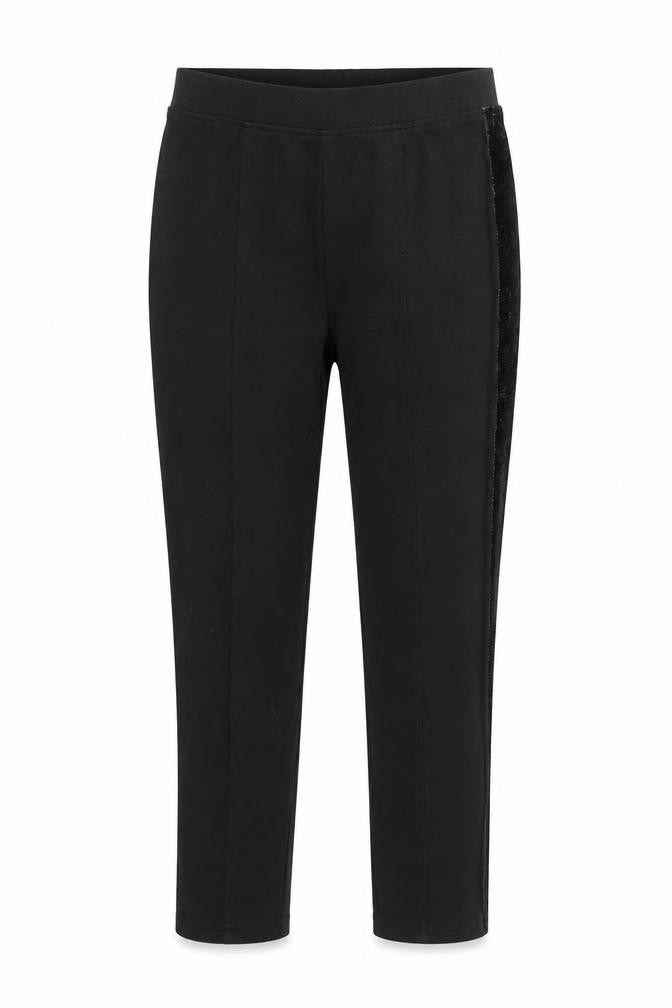 Front view of Next girls’ black jegging trousers, size 8, years