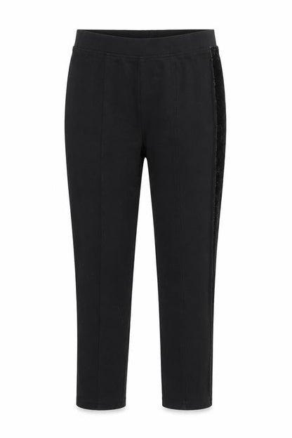 Front view of Next girls’ black jegging trousers, size 8, years