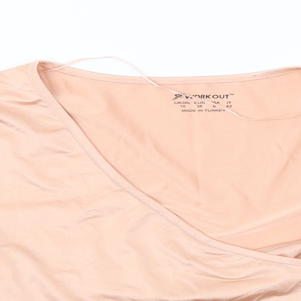 Close-up detail of WorkOut women’s pink jumper, size UK 10