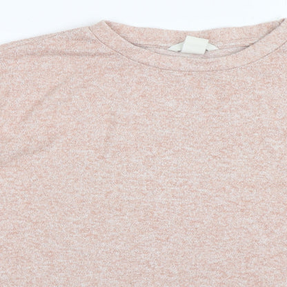 Close-up detail of H&M women’s pink jumper, size XS