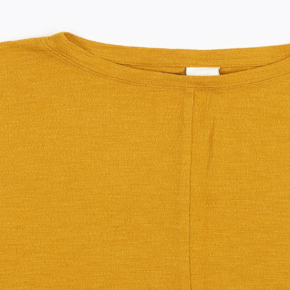 Close-up detail of H&M women’s yellow jumper, size M