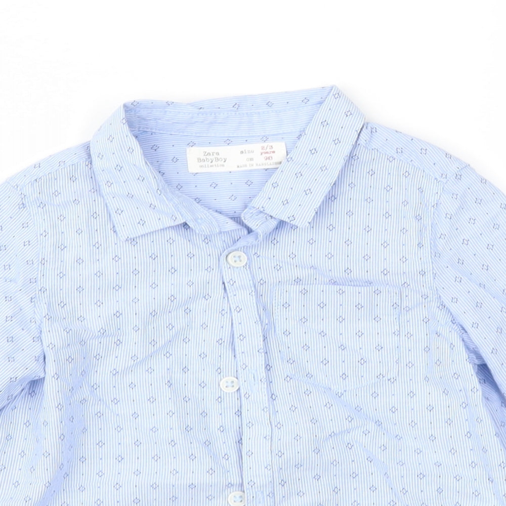 Close-up detail of Zara boys’ blue geometric basic button-up, size 2-3, years