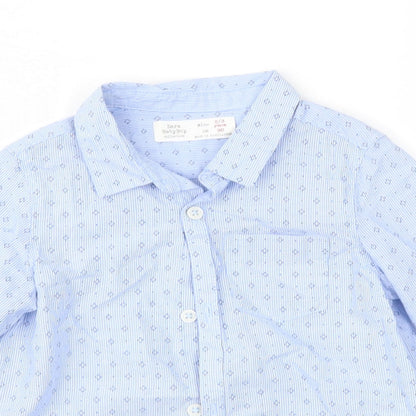 Close-up detail of Zara boys’ blue geometric basic button-up, size 2-3, years