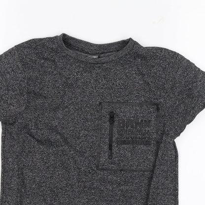 Close-up detail of Primark boys’ grey basic t-shirt, size 7-8, years