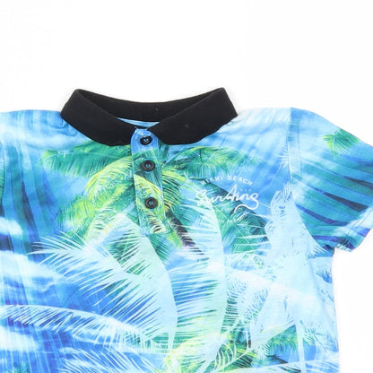 Close-up detail of utlaws girls’ blue basic t-shirt, size 7-8, years