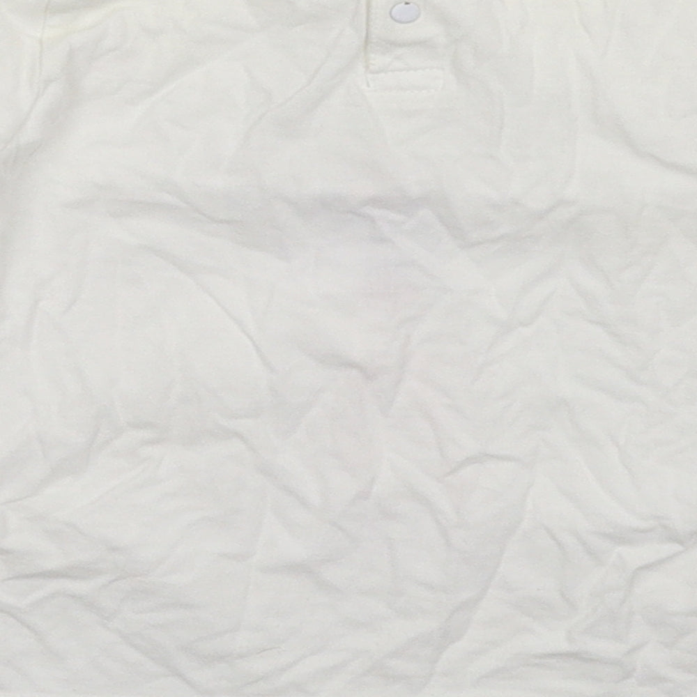 Brand and care label for DP... am girls’ white basic t-shirt, size 5, years