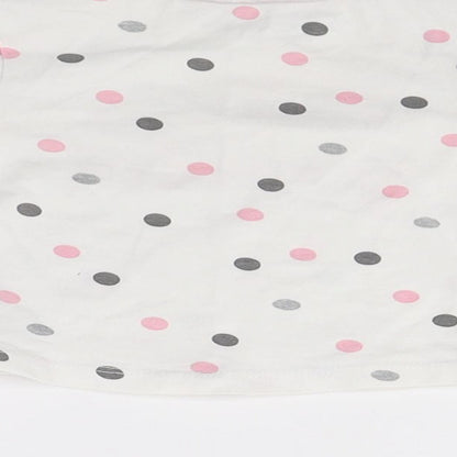 Brand and care label for Quapi girls’ white polka dot jumper, size 0-3, months - hello beautiful