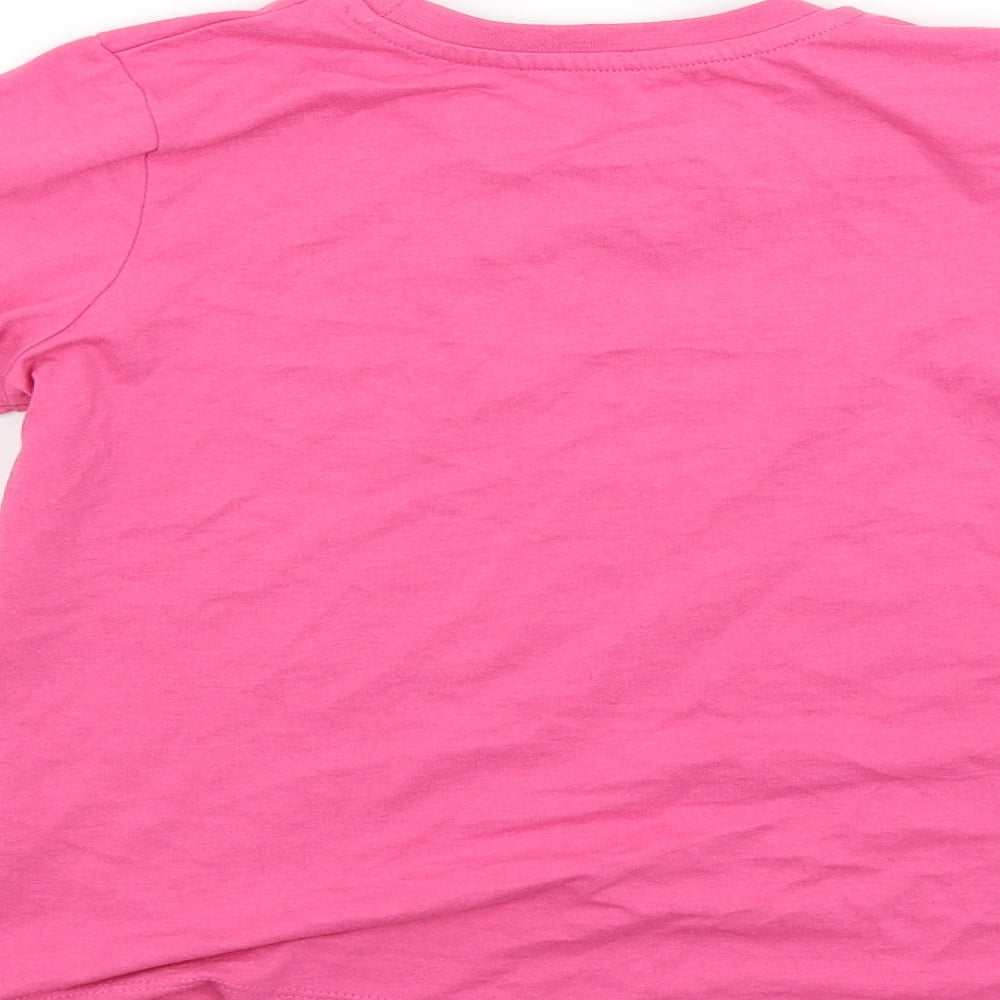 Brand and care label for Preworn girls’ pink basic t-shirt, size 9, years