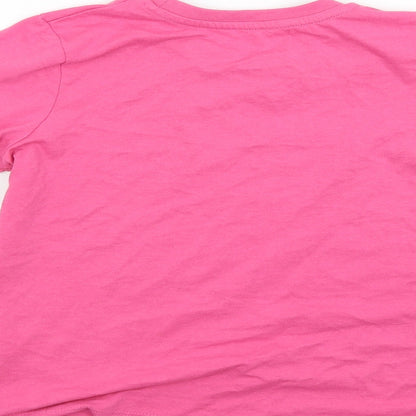 Brand and care label for Preworn girls’ pink basic t-shirt, size 9, years