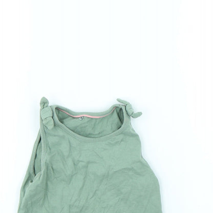Close-up detail of George girls’ green basic tank, size 8, years