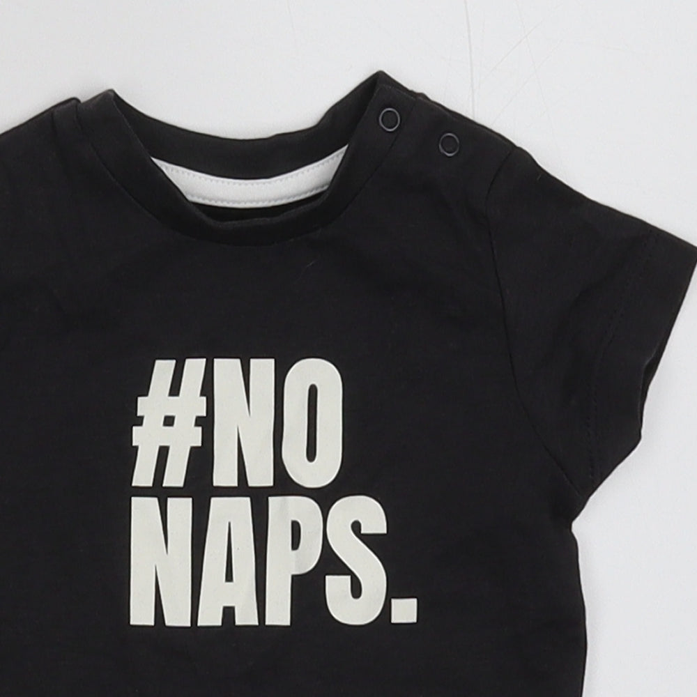 Close-up detail of Nutmeg boys’ black basic t-shirt, size 3-6, months