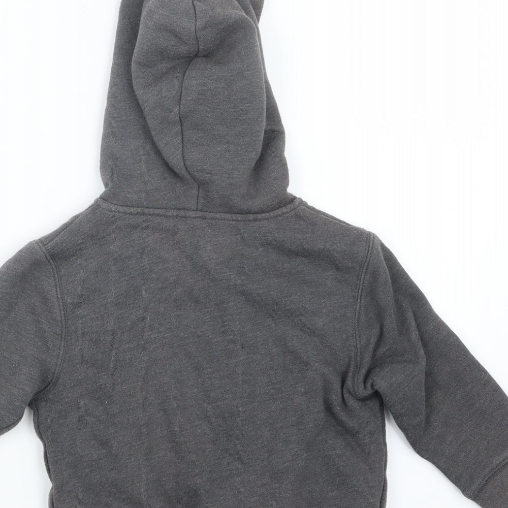 Brand and care label for Gap boys’ brown jacket, size 2, years