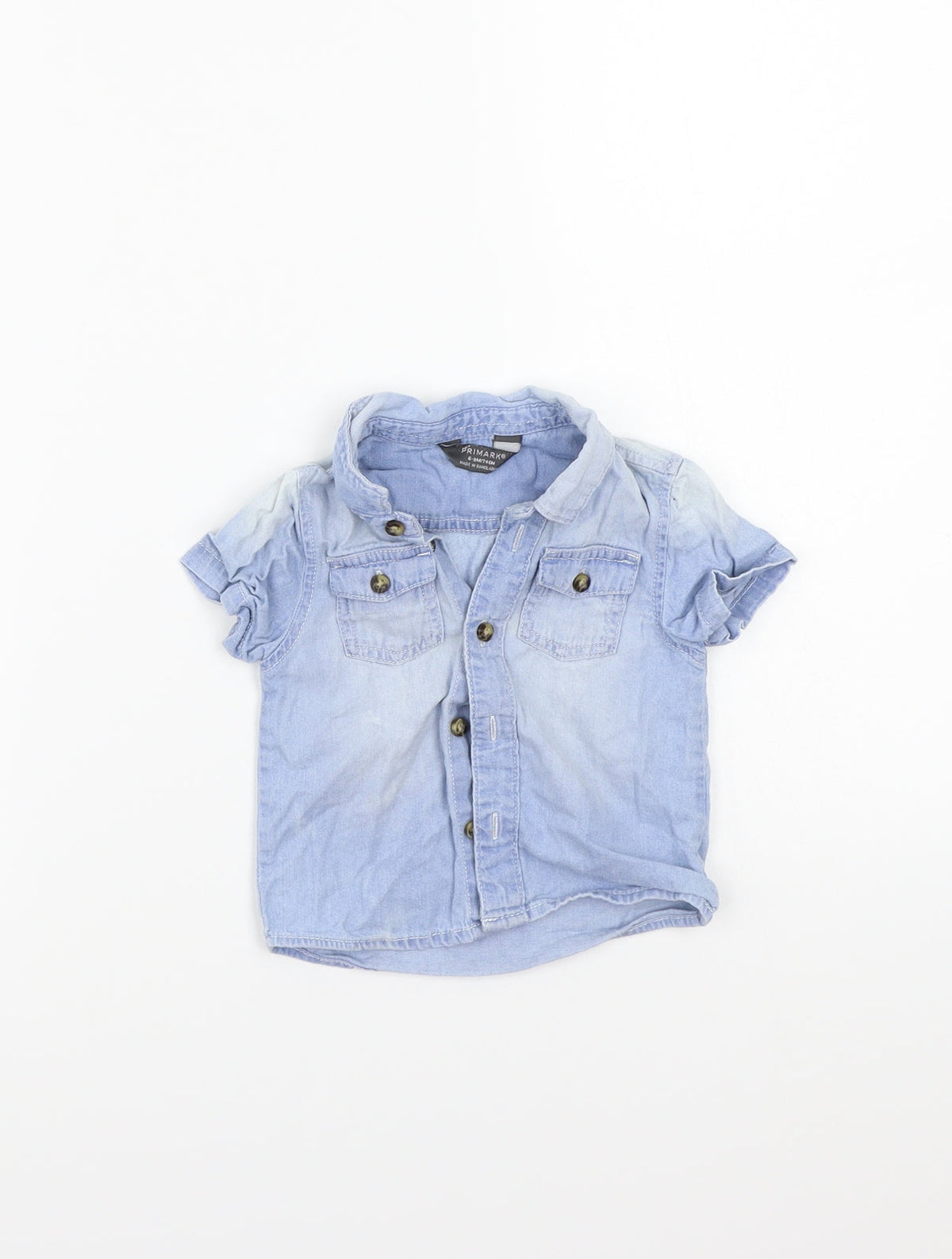 Front view of Primark girls’ blue basic button-up, size 6-9, months