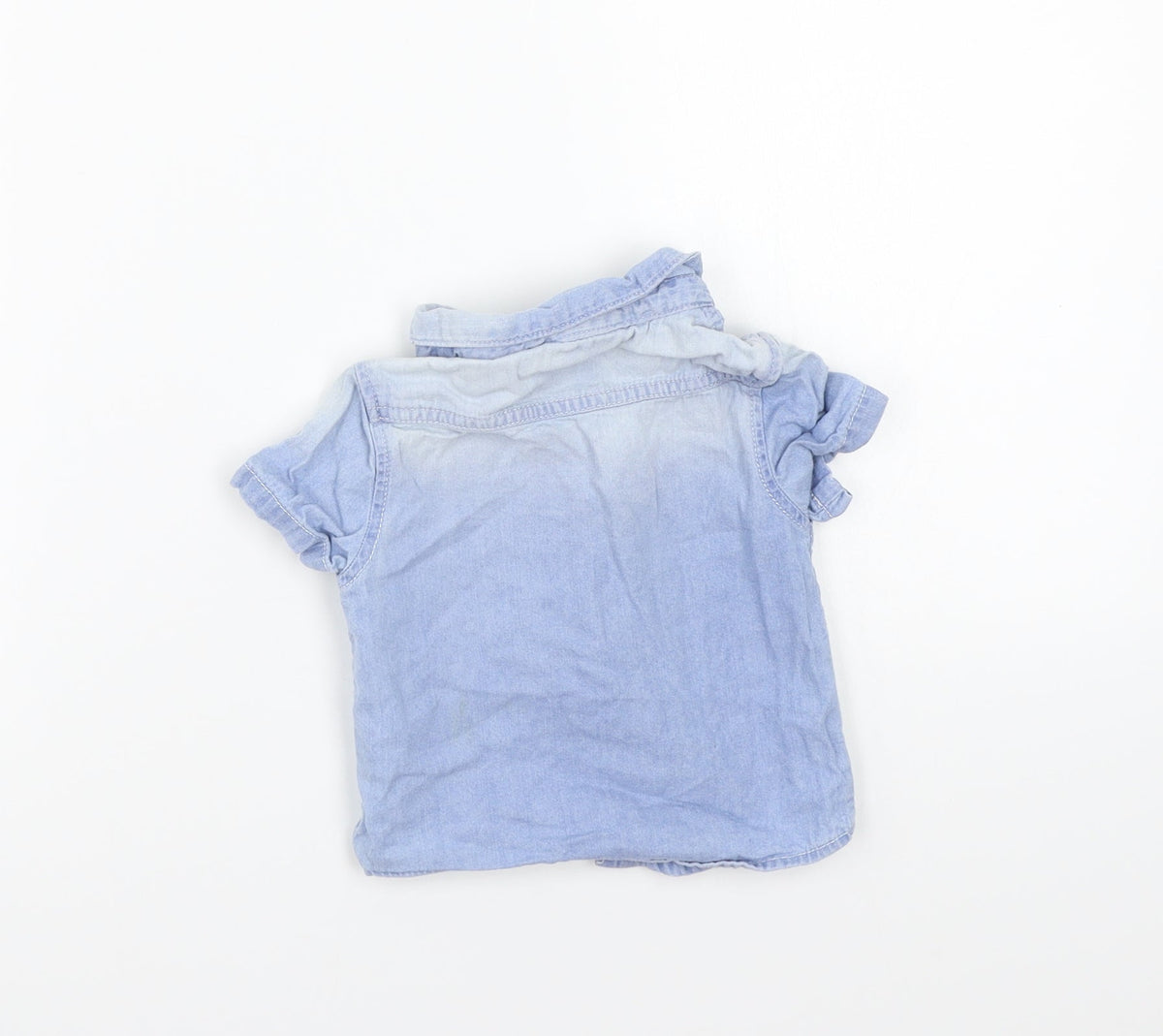 Back view of Primark girls’ blue basic button-up, size 6-9, months