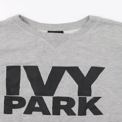 Close-up detail of IVY PARK women’s grey jersey pullover sweatshirt, size S